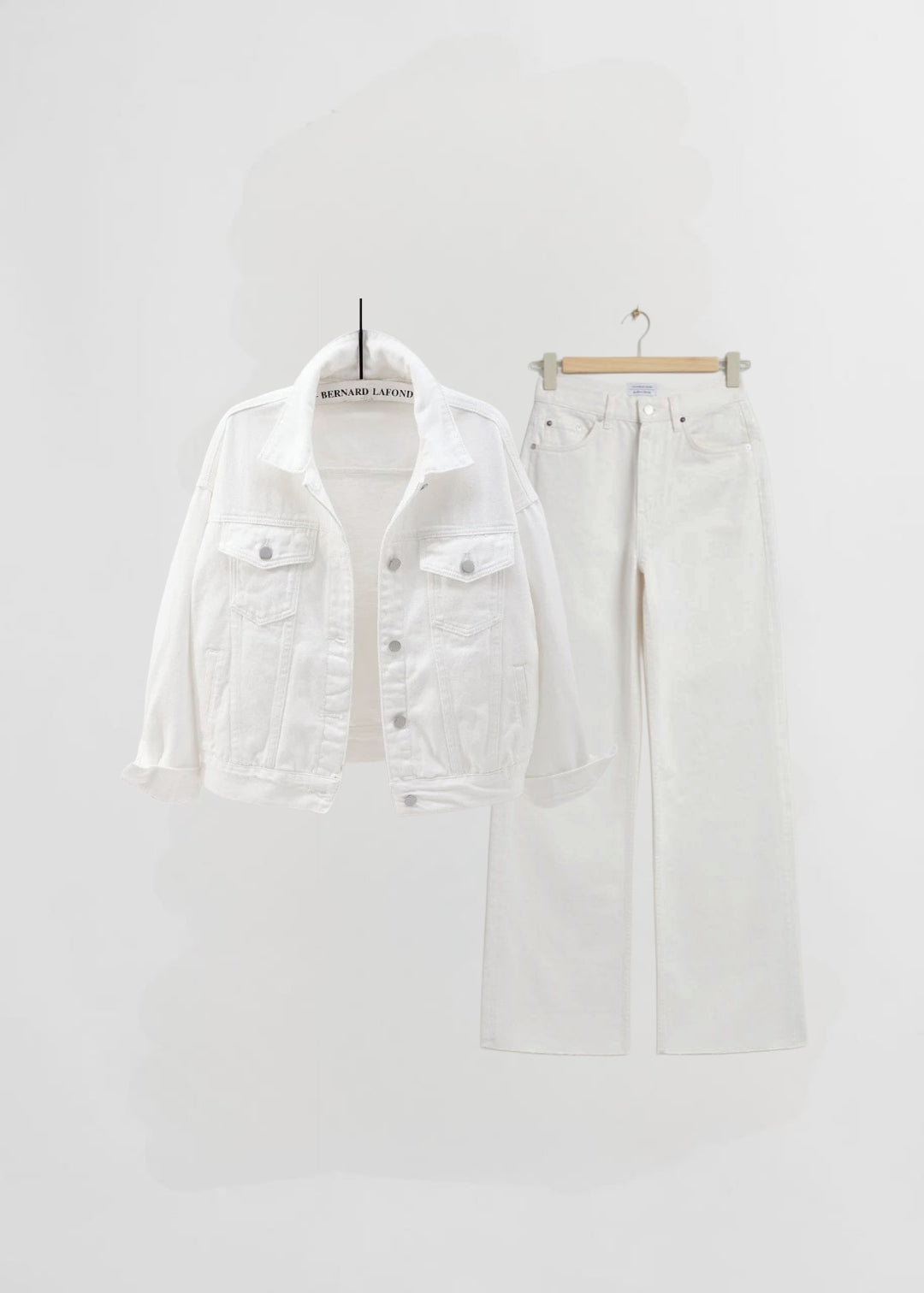 White denim jacket and white wide leg jeans