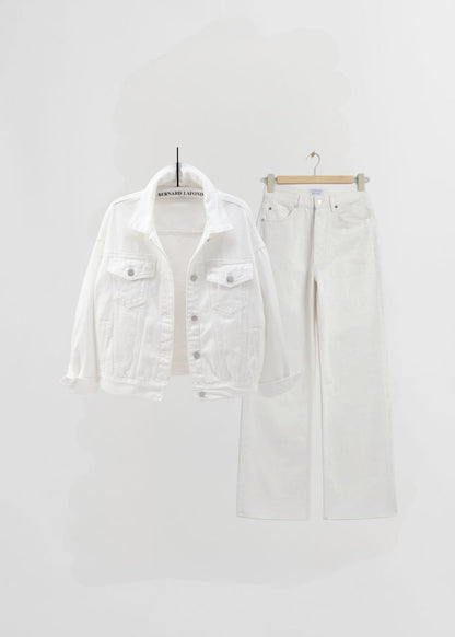 White denim jacket and white wide leg jeans