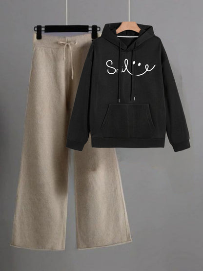 Black hoodie smile and beige flapper